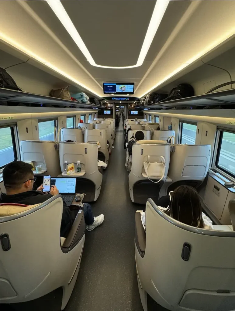 Modern Chinese high-speed train interior with spacious seats