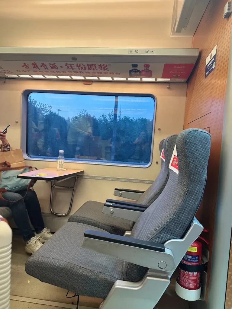 Spacious first class seats on a China bullet train interior