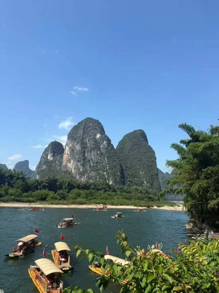 Bamboo raft on the Li River amidst the morning mist in Yangshuo