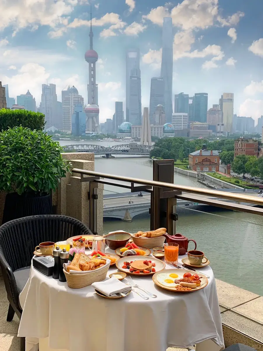 Peninsula Shanghai terrace breakfast overlooking the Huangpu River skyline