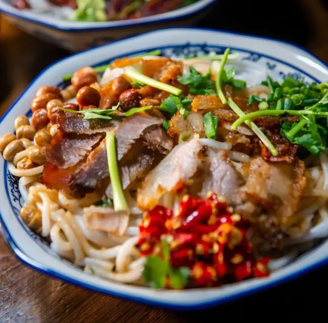 Authentic Guilin rice noodles with crispy pork belly