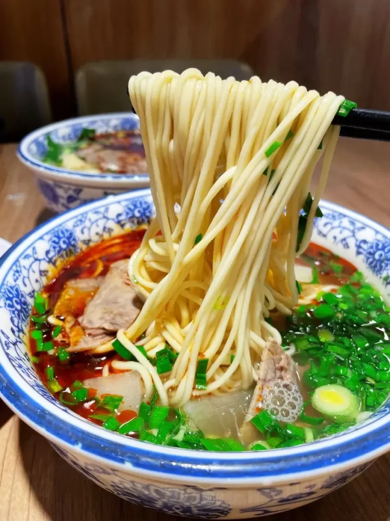 Cheap street food in China beef noodle bowl