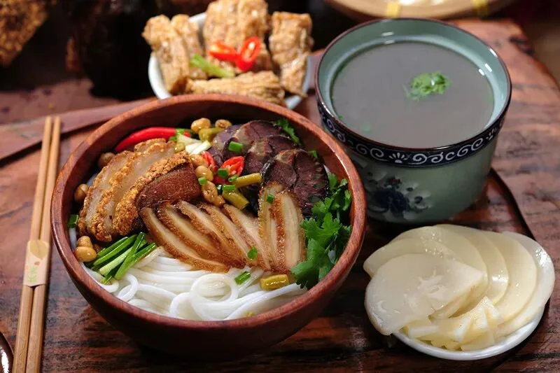 Guilin rice noodles with crispy pork belly and pickled beans