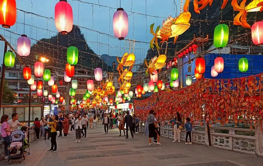 Glowing lanterns and nightlife along West Street in Yangshuo