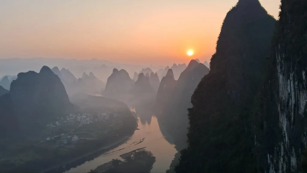 Sunrise over the Li River bend seen from Xianggong Mountain in Yangshuo